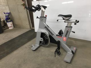 Star Trac NXT 7090 Spin Bike with Adjustable Seat, Dual Sided Pedals, Extra Durable Crank System, Push Brake Safety System, S/N SBEX0812-T13665.  (SC)