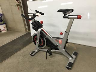 Freemotion S11.9 Carbon Drive Spin Bike with High Gear Ratio, Weighted Flywheel, Adjustable Seat, Dual Sided Pedals, Resistance Knob with Quick Stop Brake, S/N EE331K30387.  (WH)