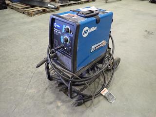 Miller Millermatic 211 Wire Welder, Auto-Set w/ MVP, 120/230V, 60 Hz, Single Phase, SN MB470333N, c/w Miller Stinger Ground Cable, Rolling Stand and Cover  (Z)