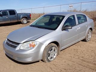 2006 Chevrolet Cobalt LS, 4-Door Sedan, Front Wheel Drive, c/w 2.2L L4 DOHC 16V Gas Engine, A/T, A/C, 185/65R15 and 195/60R15 Mixed Tires, Showing 152,018 KMs, VIN 1G1AJ55F667620601, *Note: Body Rust and Dents, Flat Left Front Tire, Won't Turn Over*