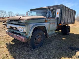 1966 GMC 950 Grain Truck, S/A, Wood Box, Hoist, Showing 44,650 Miles, SN 5C95303611180F, **Note: Running Condition Unknown, Buyer Responsible For Loadout, Item Located Offsite Near Egremont, Contact Chris For More Information 587-340-9961**