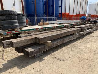 Qty of Treated Wood, Up To Approx. 26 Ft. Long **Note: Located Offsite In Spruce Grove, Contact Chris For More Information 587-340-9961**