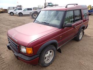 2001 Land Rover Discovery SUV, 4x4, c/w 4.0l V8 PHV 16V Engine, A/T, A/C, Leather, Power Sun Roof, P255/65R16 Tires, Showing 226,699 KMs, VIN SALTY12451A700435, *Note: Salvage Registration Status, Stiff Steering, ABS Light On, Front Bumper and Grill Damage, No Spare Tire, Glass Damage*