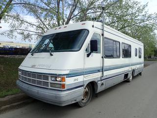 1992 Thor Pinnacle 320QB Motor Home, SN 1EMJPMS26NS104192, c/w 454 GMC Engine, A/T, A/C, 6,809 KG GVWR, 225/70R19.5 Front Tires, 8R19.5 Dual Rear Tires, Furnace, Water Heater, Fridge, Stove, Onan Emerald III 120V Genset, SN 1870039510. Showing 201,855 KMs, VIN 1GBKP37N0M3316448 *Note: Windshield Cracked*  **Located Offsite at 21220-107 Avenue NW, Edmonton, For More Information Contact Richard at 780-222-8309**