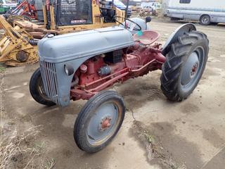 Ford 8N 2WD Tractor c/w  4-Speed Manual, PTO, 3-PT Hitch, 11.2-28 Rear Tires, *Note: Runs, Clutch Seized to Pressure Plate*  **Located Offsite at 21220-107 Avenue NW, Edmonton, For More Information Contact Richard at 780-222-8309**