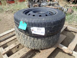 (2) R-14 In. Tires: (1) 5-Bolt Rim, (1) 4-Bolt Rim,  **Located Offsite at 21220-107 Avenue NW, Edmonton, For More Information Contact Richard at 780-222-8309**