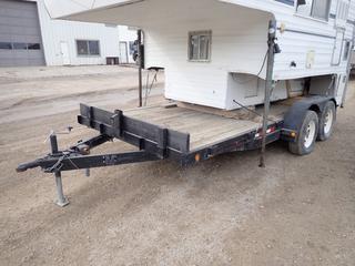 16ft T/A Flat Deck Trailer C/w 5ft X 13in Ramps, 2 5/16in Ball Hitch And ST205/75 R15 Tires. *Note: Unknown VIN, Truck Camper Not Included*
