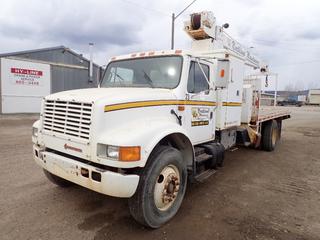 1990 International 4900 S/A Boom Truck C/w Navistar Model D-185F Diesel Engine, 5-spd Split Shift, Chelsea PTO, 13,544 GVWR, 4926kg Fronts, 8618kg Rears, 16ft X 8ft Deck, Pittman Hydralift 16,000lb Cap. 4-Stage Picker w/ 37ft 4in Max Reach Cap., (2) Outriggers, 236in W/B And 11R22.5 Tires. Showing 00139hrs, 016402kms. VIN 1HTSDZZP5LH265460 *Note: Drivers Mirror Broken*