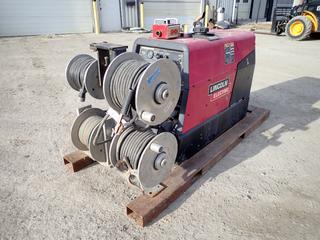 Lincoln Electric Ranger 305G Skid Mtd. Welder C/w Kohler CH23S Gas Engine, (4) Shell-Ryn Machining Aluminum Cable Reels, Welding Cable, Oxy/Acetylene Hose And Fork Pockets. Showing 0769hrs. SN U1080606246