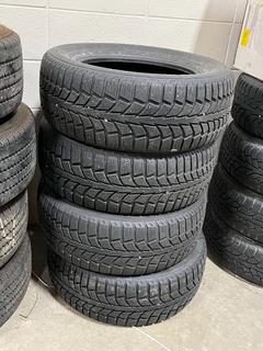 (4) Uniroyal Tiger Paw 225/60R16 Ice and Snow Tires.
