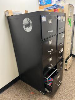 Metal 4-Drawer Filing Cabinet 18in x 26 1/2in x 52 1/2in.
