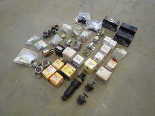 Qty Of Assorted Unused 12V And 24V Starter Relays, Indicators, Pilot Valves, Fuel Solenoid, PTO Switch, (3) 12V Batteries, Caps And Pressure Switches (C-2) 