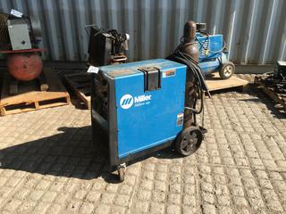 Millermatic 251 Mig Welder/Wire Feeder c/w Welding Hose, Nozzle and Wire. Including a Full Bottle of Inert Gas.