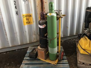 Oxy Acetylene Tanks w/ Assorted Nozzles, Welding Cable, Gauges, and Cart.