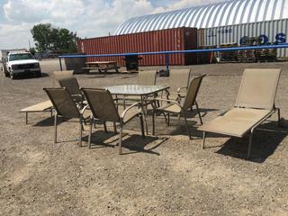 (7)Pc Patio Set c/w (6) Stacking Aluminum Patio Chairs, (1) Glass Table and (2) Aluminum Lounge Chairs.