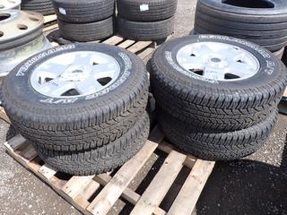 (4) Yokahama Geolandar A/T GO15 Tires P235/70R16 104T M+S w/ Ford Rims 5 Bolt Pattern.