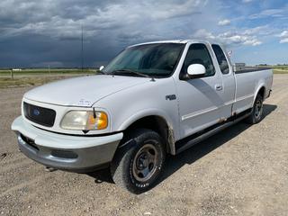 1997 Ford F150 XLT Extended Cab 4x4 Pickup c/w Triton 4.6L V8 Gas, Auto, A/C, 8 Ft. Box, Cross Bed Tool Box, 235/75R16 Tires, Showing 324,312 Kms,  VIN 1FTDX1861VKA29207