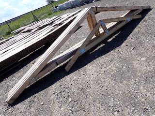 (6) 2x4 Roof Trusses, 14ft 5in L x 32in H and (1) 2x4 Roof Truss 8ft 5in L x 20in H.