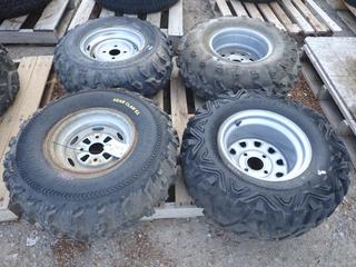 (3) AT 25x10.00 - 12 Tires w/ 4 Bolt Pattern Rims and (1) AT 25 x 10.00 - 11 Tire w/ 4 Bolt Pattern Rim.