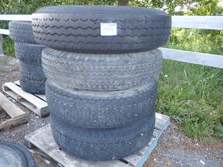 (4) Trailer Tires M-87 10.00 R22 w/ Rims.