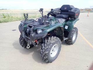 2007 Yamaha Grizzly 700 FI 4X4 ATV c/w Electric Power Steering, Warn 12V Winch, WES Industries Rear Passenger Seat w/ Storage, 27x9R12 Front Tires, 27x11R12 Rear Tires. Showing 02,969 KMs, 350 Hrs. VIN JY4AM09W37C008214, *Note: Seat Torn*