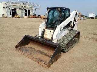 2010 Bobcat T320 Skid Steer c/w Kubota V3800 3.8L Turbo Diesel Engine, Aux Hyd, 17 1/2 In. Tracks, ISO/H-Drive w/ Hand Bucket Control Patterns, Manual Attach, 80 In. Bucket, A/C And Heater. Showing 3049hrs. SN A7MP63558