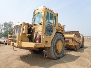 1985 Caterpillar 621B Motor Scraper c/w CAT 3406 Engine, 8-Spd Powershift Transmission, Enclosed Cab, AC/Heater And 29.5R35 Tires. Showing 14,155hrs. SN 45P03684. *Note: Hydraulic Pump Changed @14,150hrs, New Batteries, Motor Oil Filter Changed As Per Consignor* **Equipment From H&P Kosik Construction, For More Info Contact Richard @ 780-222-8309**