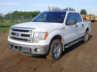 2014 Ford F150 XLT 4X4 Crew Cab Pickup c/w 5.0L V8, A/T, Tonneau Cover And LT245/75R17 Tires. Showing 285,898kms. VIN 1FTFW1EF4EKF65388 *Note: Windshield Cracked, Paint Chips On Roof*