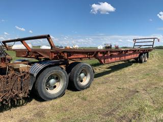 Hay Bale Trailer, Approx. 56 Ft., Tandem Axle, 11r22.5 Tires, Spring Suspension, Comes W/ Converter For Larger Farm Tractor **Loadout By Appointment, Item Located Offsite Near Viking, Contact Chris For More Info 587-340-9961**