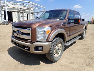 2011 Ford F-350 King Ranch Lariat SD Crew Cab 4X4 Pickup c/w 6.7L V8 Powerstroke Turbo Diesel, A/T, Leather, Sunroof, Backup Camera, Armaguard Truck Liner, Bully Dog Gauge Tuner And 35X12.0 R20LT Tires. Showing 240,287kms 7175 Engine Hrs. VIN 1FT8W3BT0BEB11471 *Note: Rust Spots On Rear Drive Fender* PL#152*