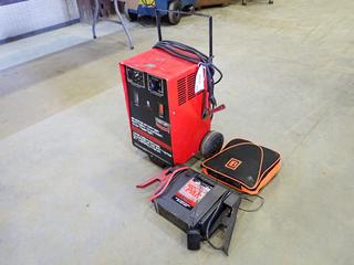 Booster Pac Model  ES2500 Jump Starter w/ 12V Power Supply And 900 Peak Amps, 100-240V Input SN 0836567 c/w Emergency Roadside Kit And Century MFG Co. Engine Starter, Battery Charger And Tester 200/40/20/2 AMP, 12V, 120V Input. *Note: Charging Time Dial Missing, Working Condition Unknown*  (N-1-1)