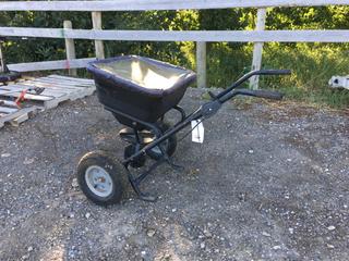 Fertilizer Spreader w/ Plastic Cover.