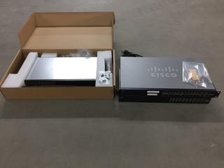 (2) Cisco Layer 3 Switches SG300-20 and (1) Cisco Layer 3 Switch SG300-28. (1-B-2)