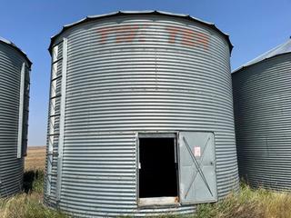 Selling Off-Site - Twister 18ft Wood Floor Grain Bin, Approximately 3,000 Bushels. Located 3.9 Klm East of High River on Highway 23, Turn North On 160 Street East For .7 Klms. Buyer is responsible for removal by Oct. 15, 2023.