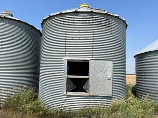 Selling Off-Site - Westeel-Rosco 14ft Wood Floor Grain Bin, Approximately 2,100 Bushels. Located 3.9 Klm East of High River on Highway 23, Turn North On 160 Street East For .7 Klms. Buyer is responsible for removal by Oct. 15, 2023.