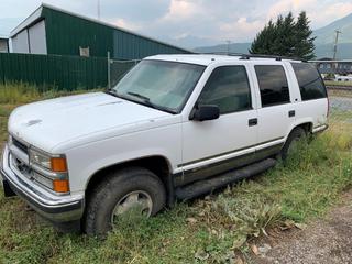 Selling Off-Site - 1997 Chev Tahoe 4WD 4-Door c/w 5.6L V8, 4 Spd Auto, VIN 1GNEK13RXVJ434547, No Keys, Running Condition Unknown, Located In Fernie, B.C. Viewing By Appointment Only Email brad.bjarnason@fernie.ca, *Note:  Out of Province*