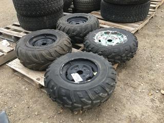 (2) Dunlop KT 415  AT25x10-12 Quad Tires w/ Rims and (2) Dunlop KT 411 AT25x8-12 Quad Tires w/ Rims.