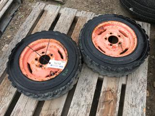 (2) Bobcat Bead Guard Standard Duty Tubeless Tires c/w 5-Bolt Rims.