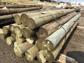 (20) 4 1/2in to 5 1/2in Diameter Green Pressure Treated Posts Approximately 8ft L.