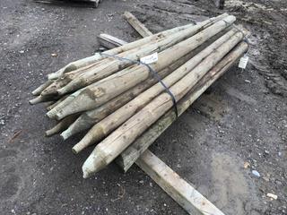 (27) 3in to 3 1/2in Diameter Green Pressure Treated Fence Posts 6ft to 7ft L.