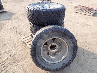 (4) TOYO M/T Open Country 35x12.50R18LT Tires on 8-Bolt XD Aluminum Rims