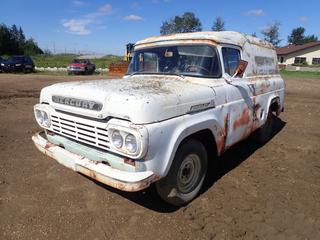 1958 Ford Mercury 100 Panel Truck c/w Inline 6 Engine, Manual Transmission, Doors, Bumper, Tank, Spare Tire. Showing 99,717Miles. *Note: Doors, Bumper, Tank Located In Back Of Truck, Does Not Run*