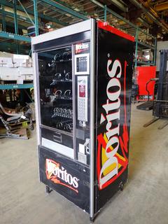 Doritos Snack Vending Machine, 27 1/2 In. X 32 1/2 In. X 72 In. *Note: No Keys, Running Condition Unknown*  (Z)