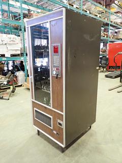 Lektro Automatic Snack Vending Machine Model VS99A21EII, 115V, 60HZ, 3.2A, SN 7098, 34 In. X 29 In. X 72 In., *Note: Running Condition Unknown*  (Z)