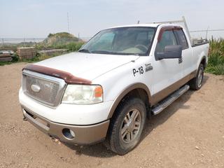 2006 Ford F150 Lariat 4X4 Extended Cab Pickup c/w 5.4L Triton, V8, A/T, 7200lb GVWR, Delta Storage Box, Headache Rack And LT275/70R18 Tires. Showing 287,746kms. VIN 1FTPX14546NA47386 *Note: Drive Shaft In Box Of Truck, Engine Runs, Does Not Drive, Windshield Cracked* 