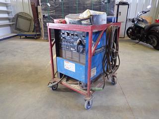 Miller Syncrowave 250, CC-AC/DC Welding Power Source, 200/230/460V, 105.8/92/46A, 11.4KW, Single Phase, SN KG267493, c/w Cart, Welding Cable, Qty of Welding Rods and Supplies  (H)