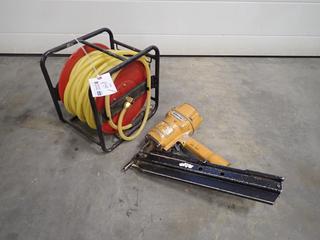 Stanley Bostitch Pneumatic Nailer c/w Reel And Air Hose *Note: This Item Is Located Offsite In Alberta Beach, For More Info Contact Richard @780-222-8309*