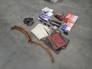 Qty Of Trailer Lights, U-Bolts, Brake Shoes, Leaf Springs, CB Radio And Assorted Parts And Hardware *Note: This Item Is Located Offsite In Alberta Beach, For More Info Contact Richard @780-222-8309*