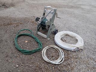 Hose Reel c/w Garden Hose And Ipex 3/4 In. Water Line *Note: This Item Is Located Offsite In Alberta Beach, For More Info Contact Richard @780-222-8309*