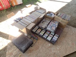 Qty Of Vinyl Records, Cassettes And Hitachi HT350 Turn Table *Note: Working Condition Unknown, This Item Is Located Offsite In Alberta Beach, For More Info Contact Richard @780-222-8309*